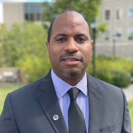 Headshot of Derrick Brooms, Ph.D.